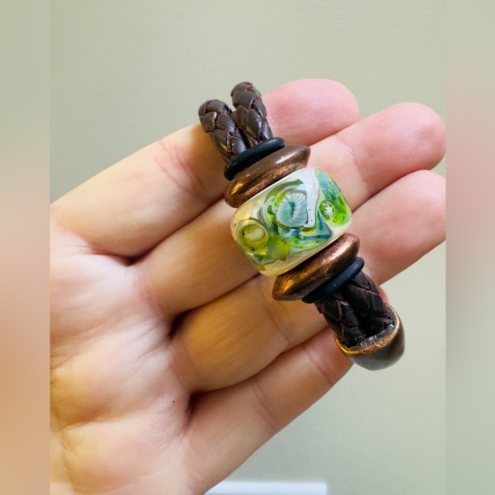 Artisan made green Glass Bead, dark brass, and braided leather Bracelet
